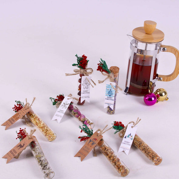 Christmas Tea Favors for Guests Gifts, Happy Holiday Favors, Glass Tube Tea Party Favors Items designed by Happy Times Favors, a handmade gift shop. These glass cork vials/jars are filled with 11 different tea. Ideal for Christmas, Noel, New Year, Happy Holiday party gifts, Personalized Christmas Gifts, Custom Gifts for Christmas, Christmas gifts for family, friends, coworkers, Xmas favors, Noel gifts