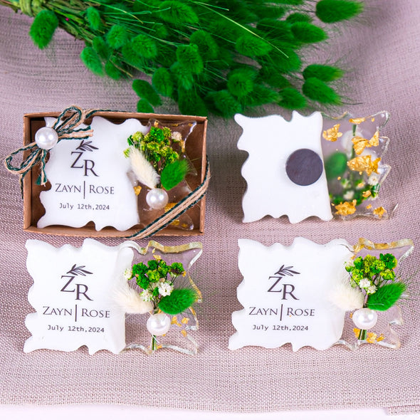 Epoxy Resin Magnet, Wedding Favors, Wedding Favors for Guests in Bulk, Birthday Magnet Favors, Baby Shower Favors, Bulk Fridge Magnet Favors Items designed by Happy Times Favors, a handmade gift shop. Epoxy Resin magnet favor decorated with real natural dried flowers and Custom clear sticker label. Ideal for baptism, wedding favors, unique gifts for guests, thank you gifts, Baby shower, bridal shower, baby sprinkle, baby shower decoration, party gifts.