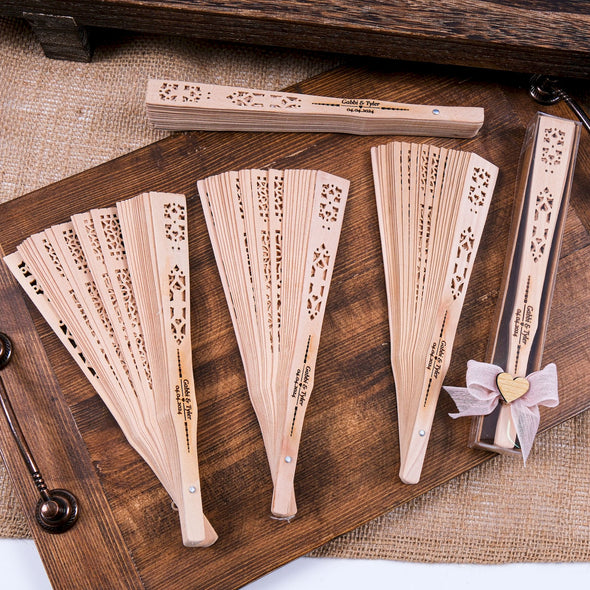 Personalized Wedding Favors: Engraved Wooden Hand Fans (Sandalwood) Items designed by Happy Times Favors, a handmade gift shop. This item is ideal for, wedding favors, unique gifts for guests, thank you gifts, bridal shower favors, baptism favors, bridesmaid favors, engagement favors, party gifts, Noel, New Year, Happy Holiday. Personalized Christmas Gifts, Custom Gifts for Christmas

