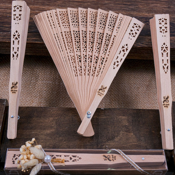 Personalized Wedding Favors: Engraved Wooden Hand Fans (Sandalwood) Items designed by Happy Times Favors, a handmade gift shop. This item is ideal for, wedding favors, unique gifts for guests, thank you gifts, bridal shower favors, baptism favors, bridesmaid favors, engagement favors, party gifts, Noel, New Year, Happy Holiday. Personalized Christmas Gifts, Custom Gifts for Christmas

