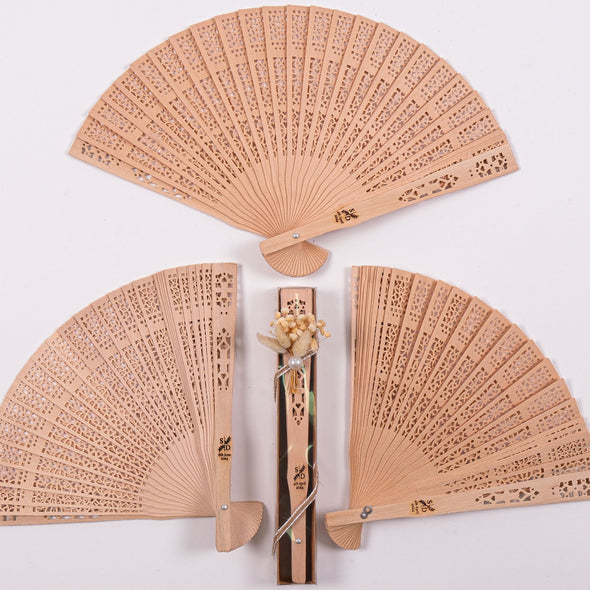 Personalized Wedding Favors: Engraved Wooden Hand Fans (Sandalwood) Items designed by Happy Times Favors, a handmade gift shop. This item is ideal for, wedding favors, unique gifts for guests, thank you gifts, bridal shower favors, baptism favors, bridesmaid favors, engagement favors, party gifts, Noel, New Year, Happy Holiday. Personalized Christmas Gifts, Custom Gifts for Christmas

