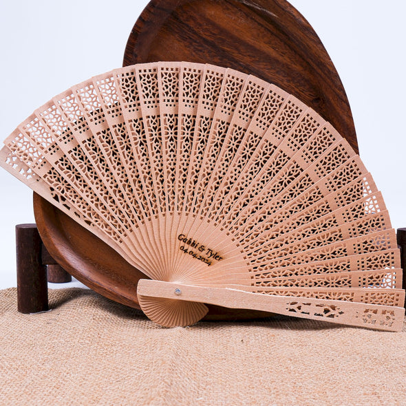 Personalized Wedding Favors: Engraved Wooden Hand Fans (Sandalwood) Items designed by Happy Times Favors, a handmade gift shop. This item is ideal for, wedding favors, unique gifts for guests, thank you gifts, bridal shower favors, baptism favors, bridesmaid favors, engagement favors, party gifts, Noel, New Year, Happy Holiday. Personalized Christmas Gifts, Custom Gifts for Christmas

