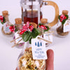 Christmas Tea favors for guests, Personalized Bulk Christmas gifts, Happy Holiday favors, Loose Leaf Tea Favor, Tea jars, Unique gift, Herbal Tea gifts Items designed by Happy Times Favors, a handmade gift shop. These glass cork vials/jars are filled with 11 different tea. Ideal for Christmas, Noel, New Year, Happy Holiday party gifts. Personalized Christmas Gifts, Custom Gifts for Christmas.