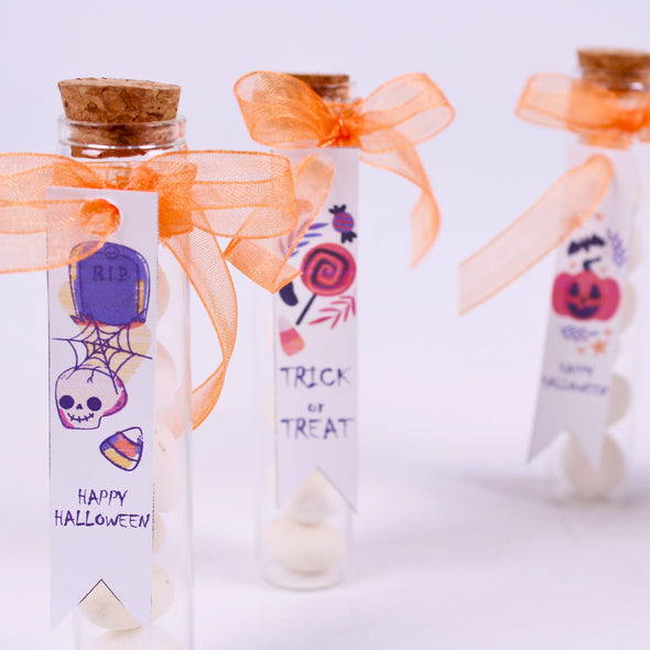 Halloween Candy Favors-Halloween Party Gifts Items designed by Happy Times Favors, a handmade gift shop. Tube with candies, with a nice sateen-tulle ribbon bow tie and white tag. Ideal for Halloween, Christmas, wedding favors, unique gifts for guests, thank you gifts, bridal shower favors, baptism favors, bridesmaid favors, engagement favors, party gifts.