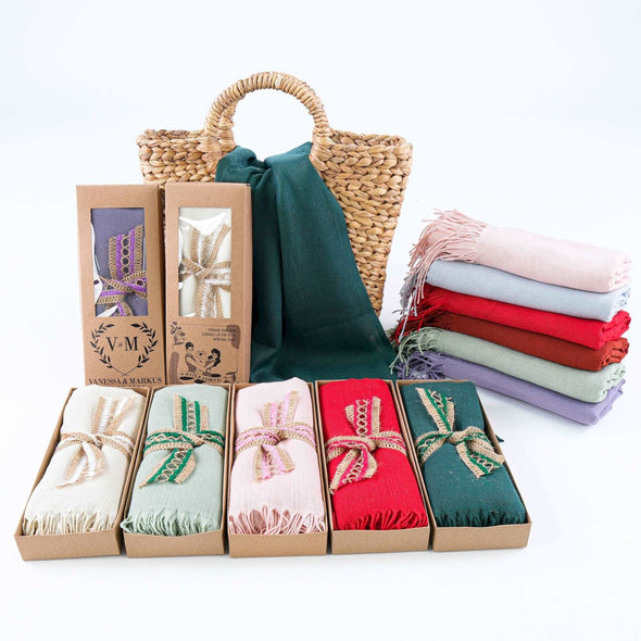 Unforgettable Wedding Favors: Make your wedding unforgettable with these unique and luxurious pashmina shawls as favors for guests. They'll be a cherished keepsake of your special day, long after the cake is gone.